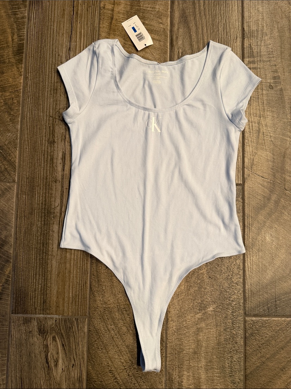NWT Calvin Klein Light Blue Scoop Neck Short Sleeve Bodysuit